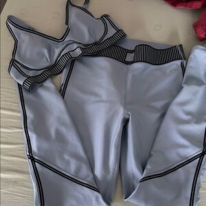 ALO Yoga Light blue airlift line up set with meshed side leggings full length